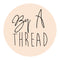 By A Thread Boutique Logo